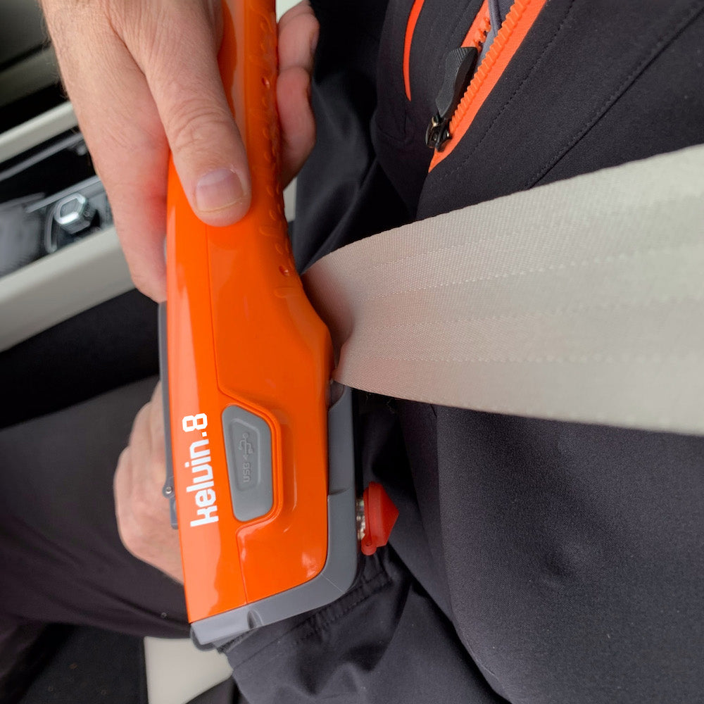 Kelvin 8 emergency tool cutting a seatbelt in a car